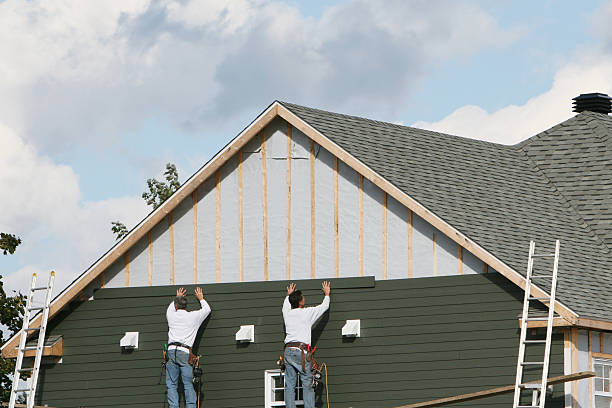 Professional Siding technician working in Sutersville, PA